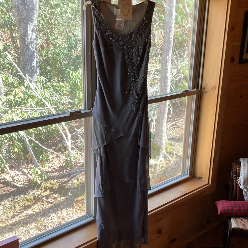 New with tags, size 8 Grey floor length Alfred Angelo beaded dress